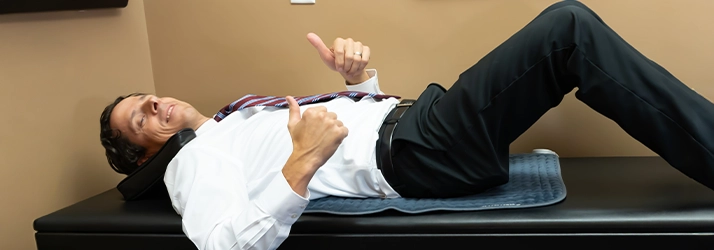 Chiropractor Oakdale MN Benjamin Smetana On Decompression Table